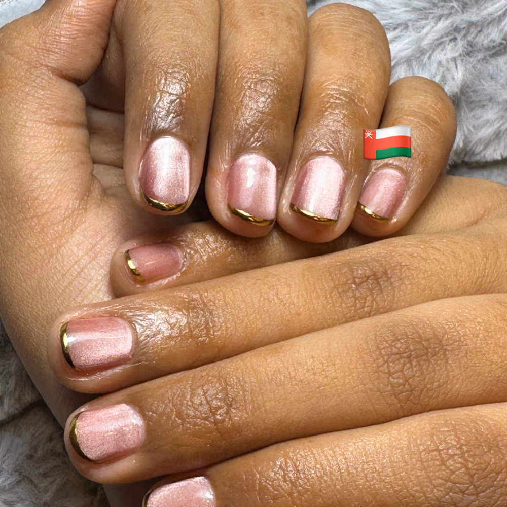Nail extensions shaped and finished, ladies salon Seeb
